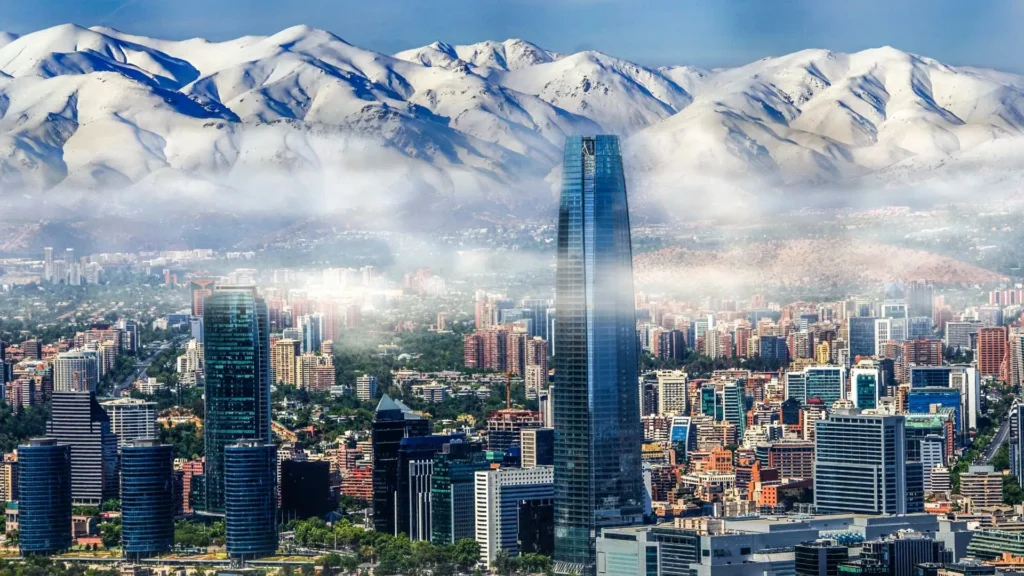 Skyline of Santiago de Chile with the Gran Torre Costanera and the snowy Andes Mountains in the background